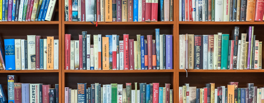 Library shelves with books